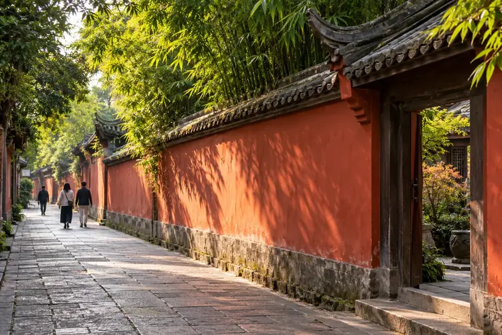 Illustration of a Sichuan-style red-walled lane with bamboo shadows